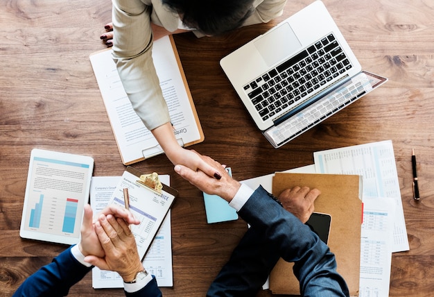 Free Photo business people shaking hands together
