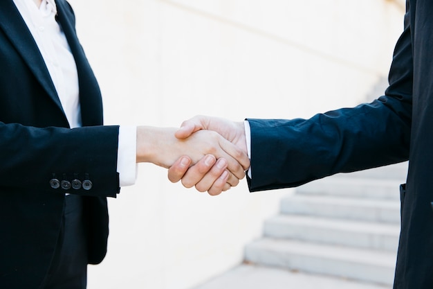 Business people shaking hands