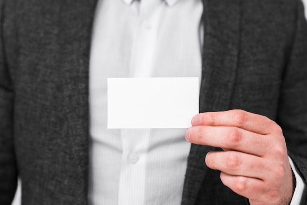 Business people showing blank business card