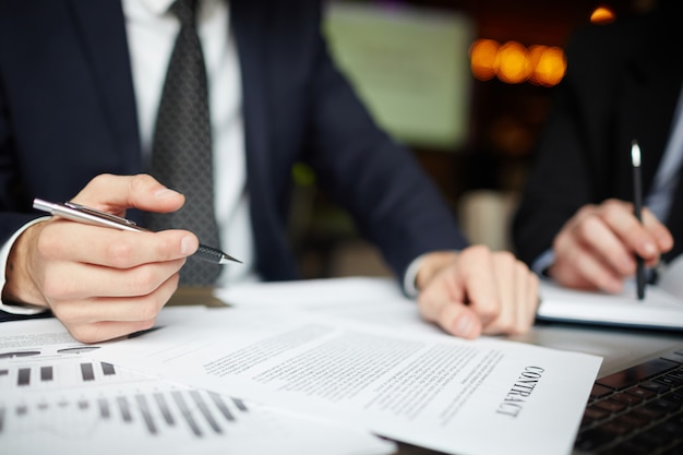 Business People Signing Contract Closeup