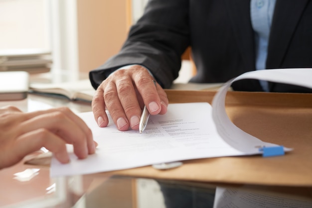 Business people signing a contract