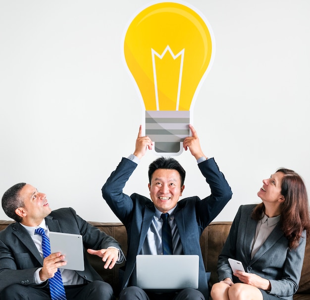 Free photo business people sitting together with icons