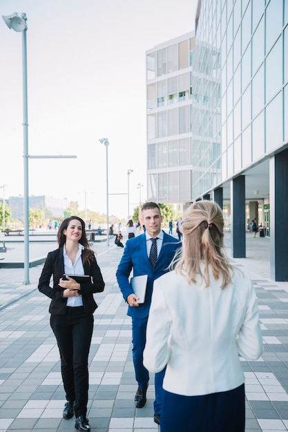 Business people in street scene