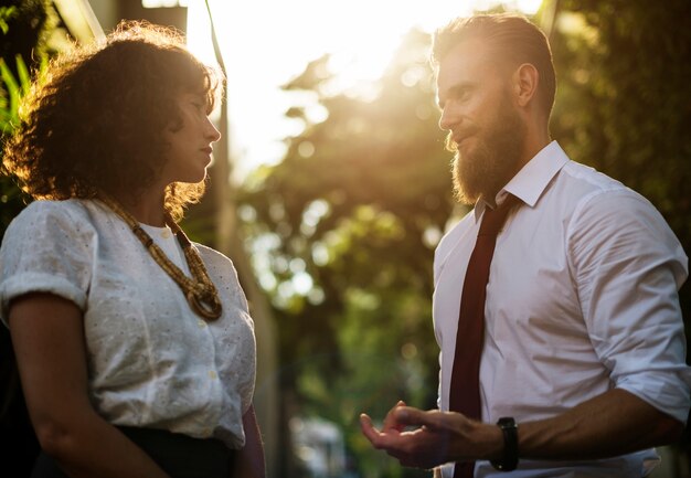 Business people talking together in the park