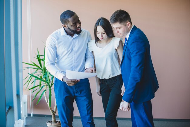 Business people walking in office