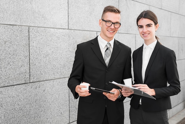 Business people with clipboard