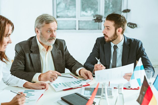 The business people working together at table.