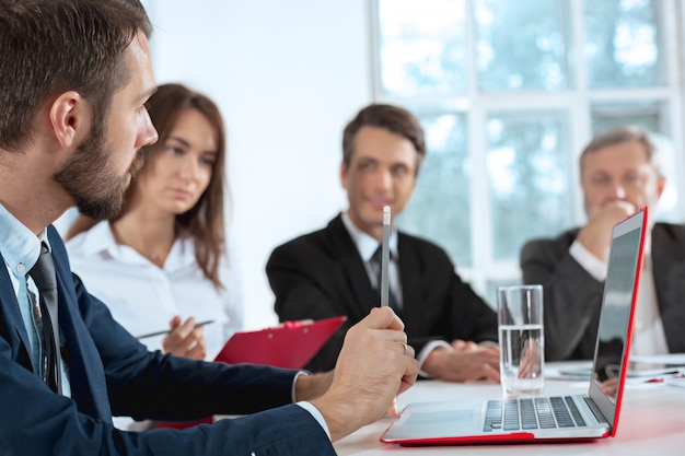 The business people working together at table.