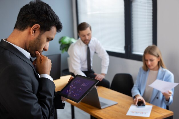 Business person looking at finance graphs