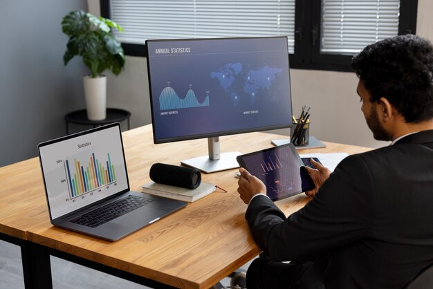 Business person looking at finance graphs
