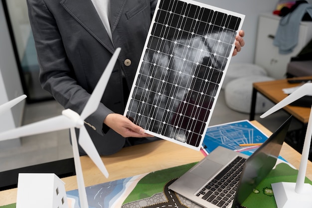 Free photo business person planning for alternative energies
