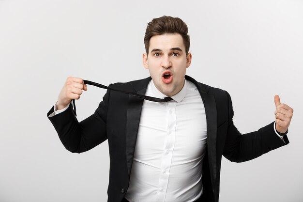 business situation concept: frustrated business person angrily yelling at camera.