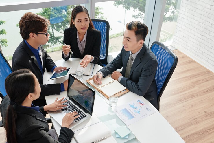ฟรี Photo business team discussing project