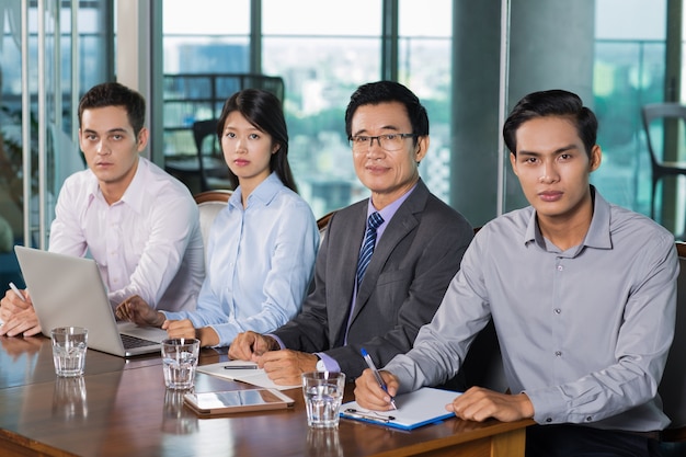 Business Team Holding Meeting in Office