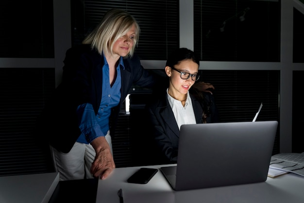 Business teammates working late