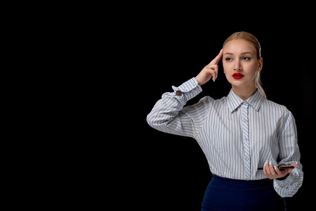 Business woman blonde pretty girl thinking holding the phone with red lipstick in office costume