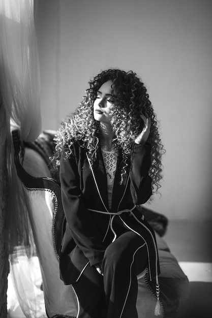 Business woman in classy suit in studio