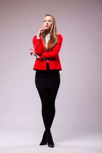 Business woman full body standing isolated on white wall with copy space.