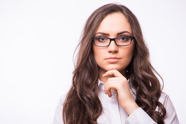 Business woman in glasses isolated on white wall