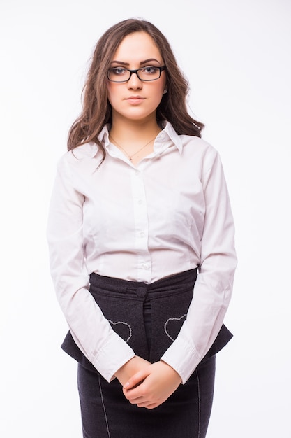 Business woman in glasses isolated on white wall