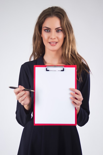 Business woman holding a clipboard with pen and copy space, isol