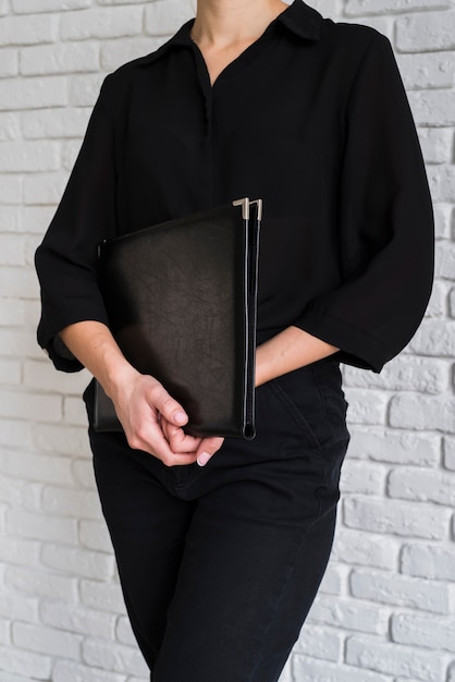 Business woman holding clipboard