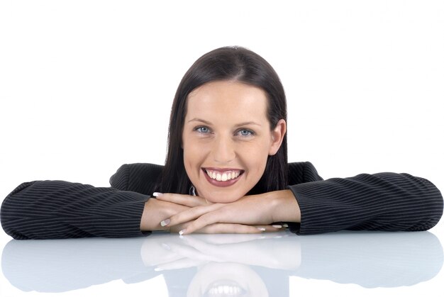 Business woman leaning on a desk