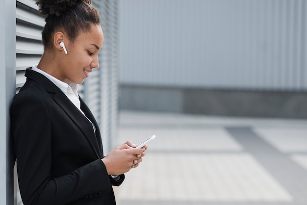 Business woman looking on device