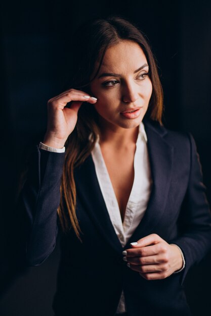 Business woman at the office late at night