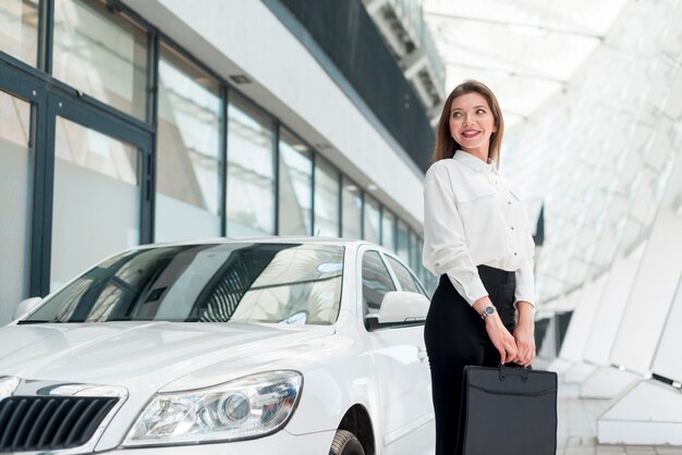 Business woman posing in the street