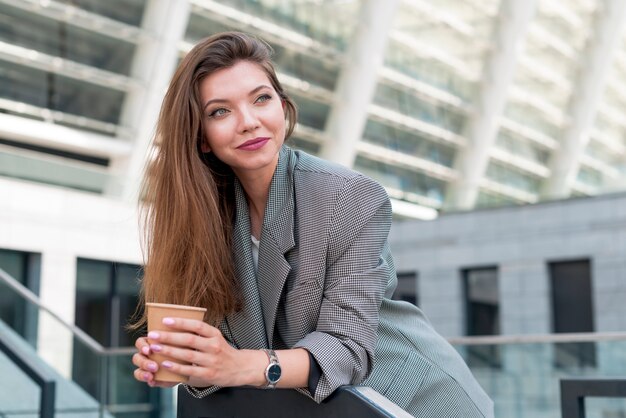 Business woman posing in the street