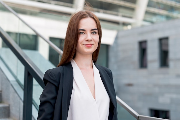 Business woman posing in the street