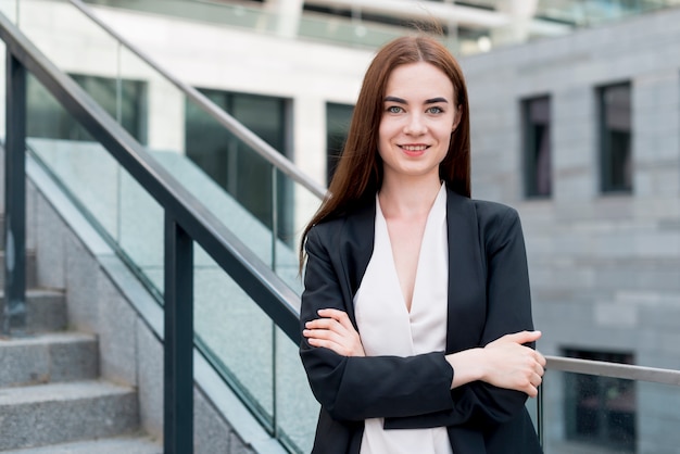 Business woman posing in the street