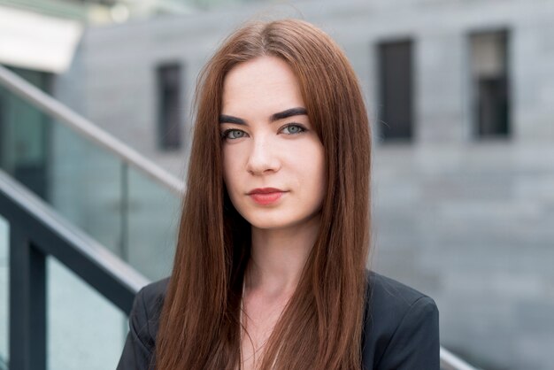 Business woman posing in the street