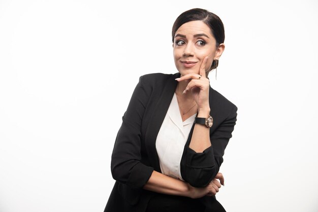 Business woman posing in suit on a white background. High quality photo