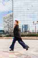 Free photo business woman running on street