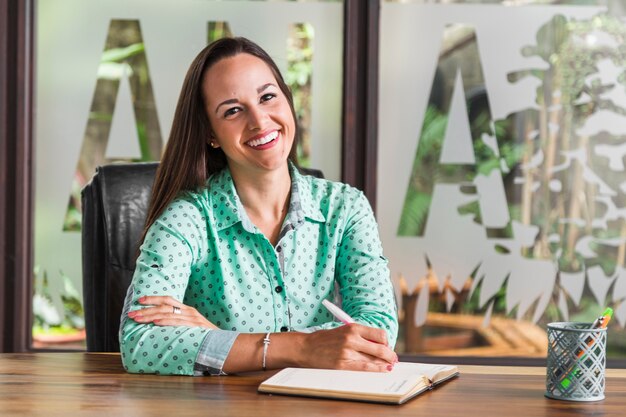 Business woman sitting on her chair