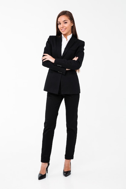 Business woman standing with arms crossed