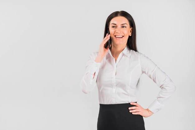 Free photo business woman talking by phone