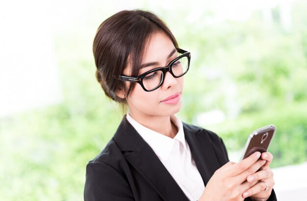 Business woman talking cellphone