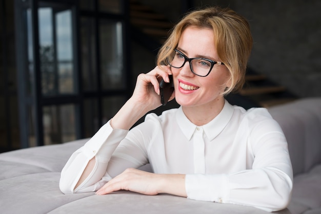 Business woman talking on phone 