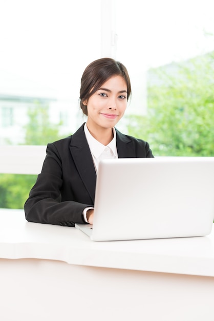 Business woman using computer laptop