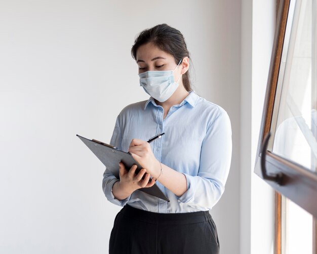 Business woman wearing medical mask