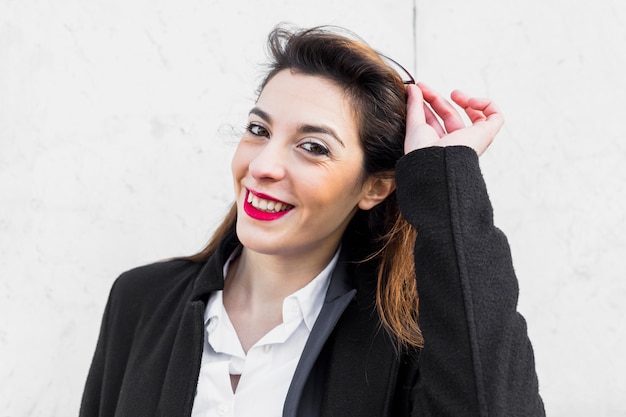 Free photo business woman with glasses smiling