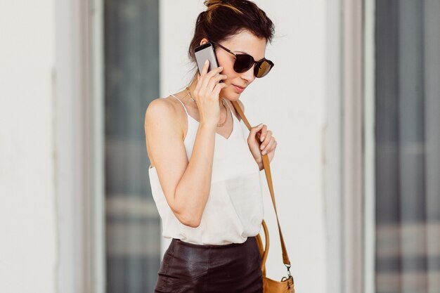 Business woman with mobile phone