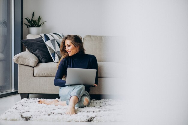 Business woman working on laptop at home