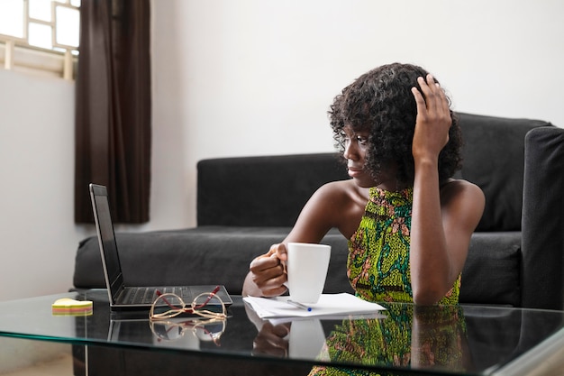 Business woman working online at home