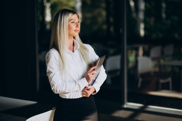 Business woman working on tablet