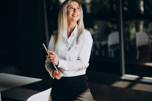 Business woman working on tablet