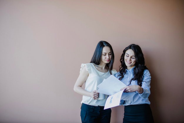 Business women with papers